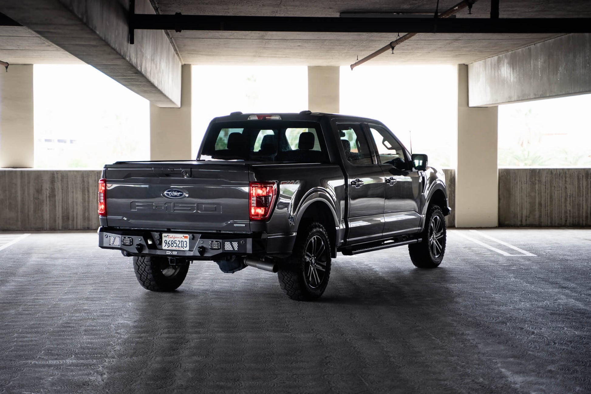 2021-2023-f150-made-to-offroad-rear-bumper-factory-license-installed.jpg