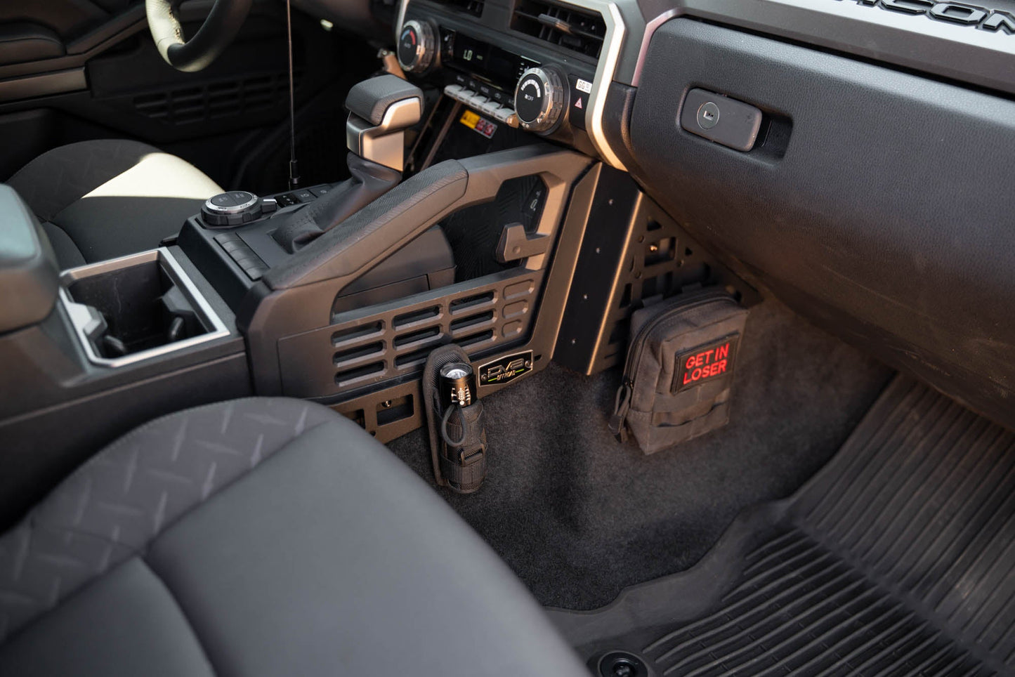 2024-Tacoma-Center-Console-Molle-Panels-_-Device-Mount-Installed-5.jpg
