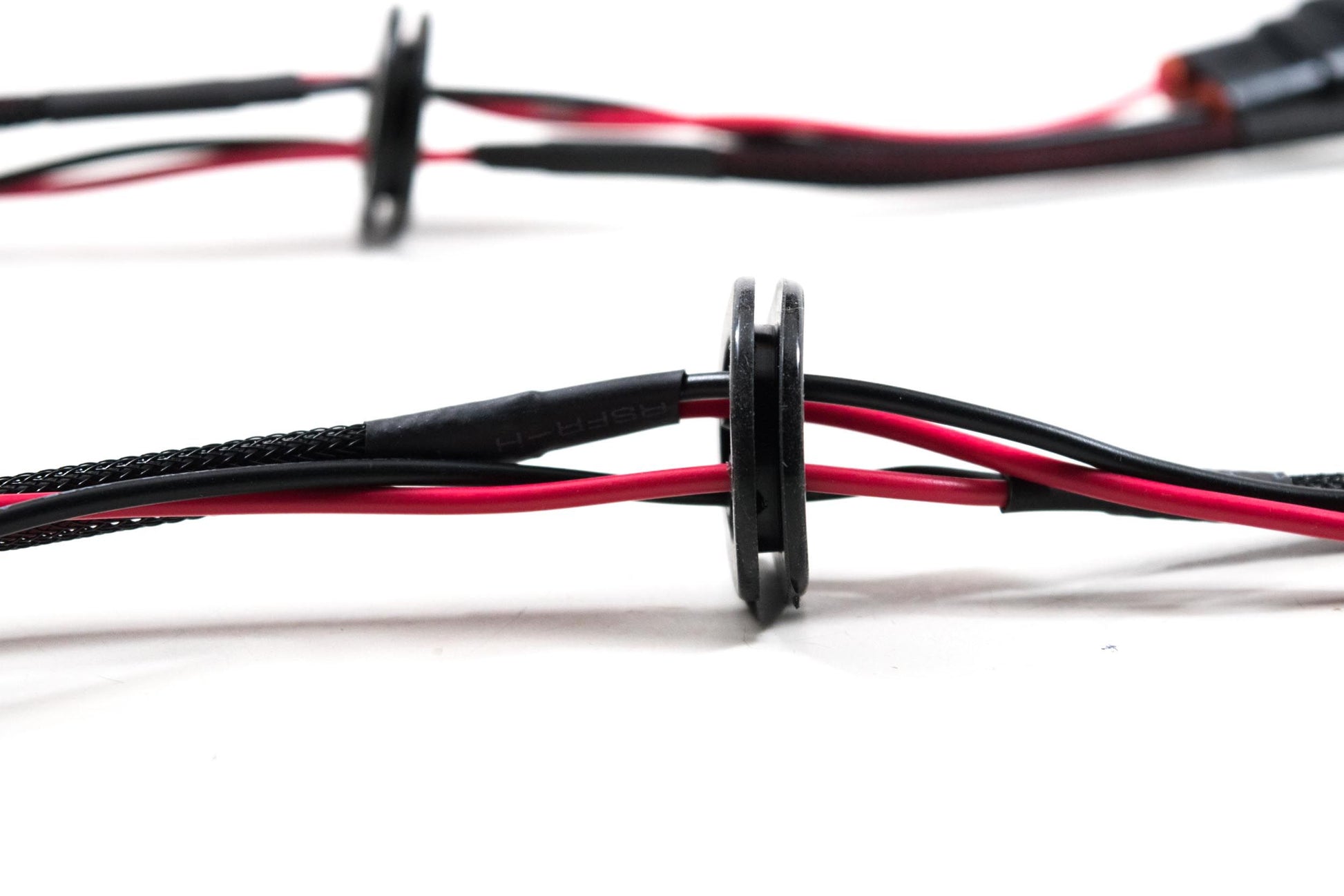 Harness: H-Series housing pass-through cables w/ grommet (9006) - Trucks R Us