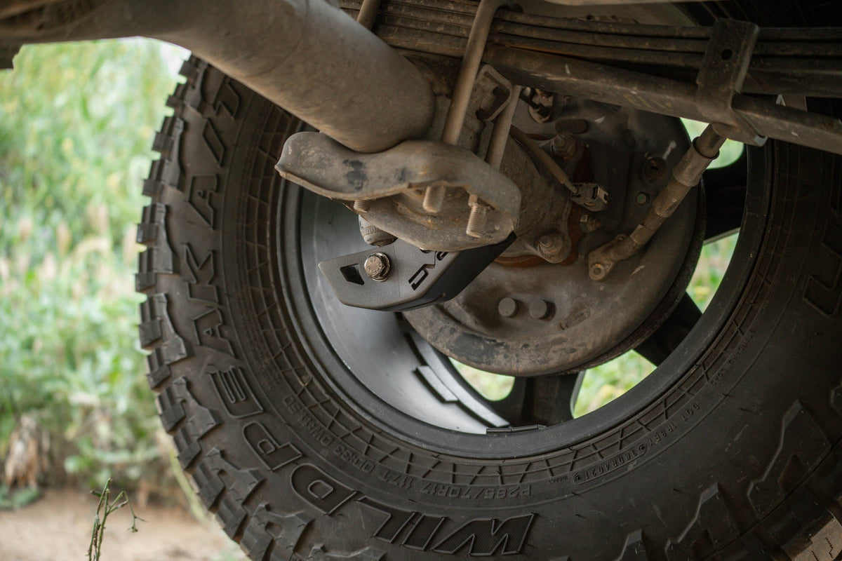 3rd-gen-Toyota-Tacoma-Rear-Shock-Skid-Plates-Installed-05.jpg