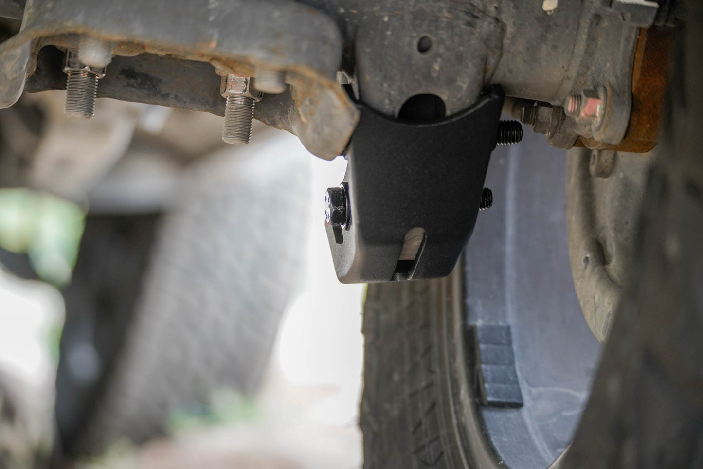 3rd-gen-Toyota-Tacoma-Rear-Shock-Skid-Plates-Installed-08.jpg