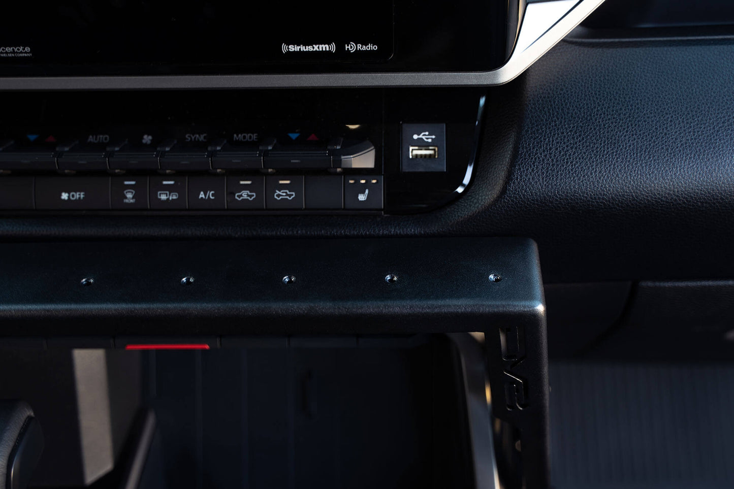 4th-gen-toyota-tundra-center-console-molle-panels-device-mount.jpg