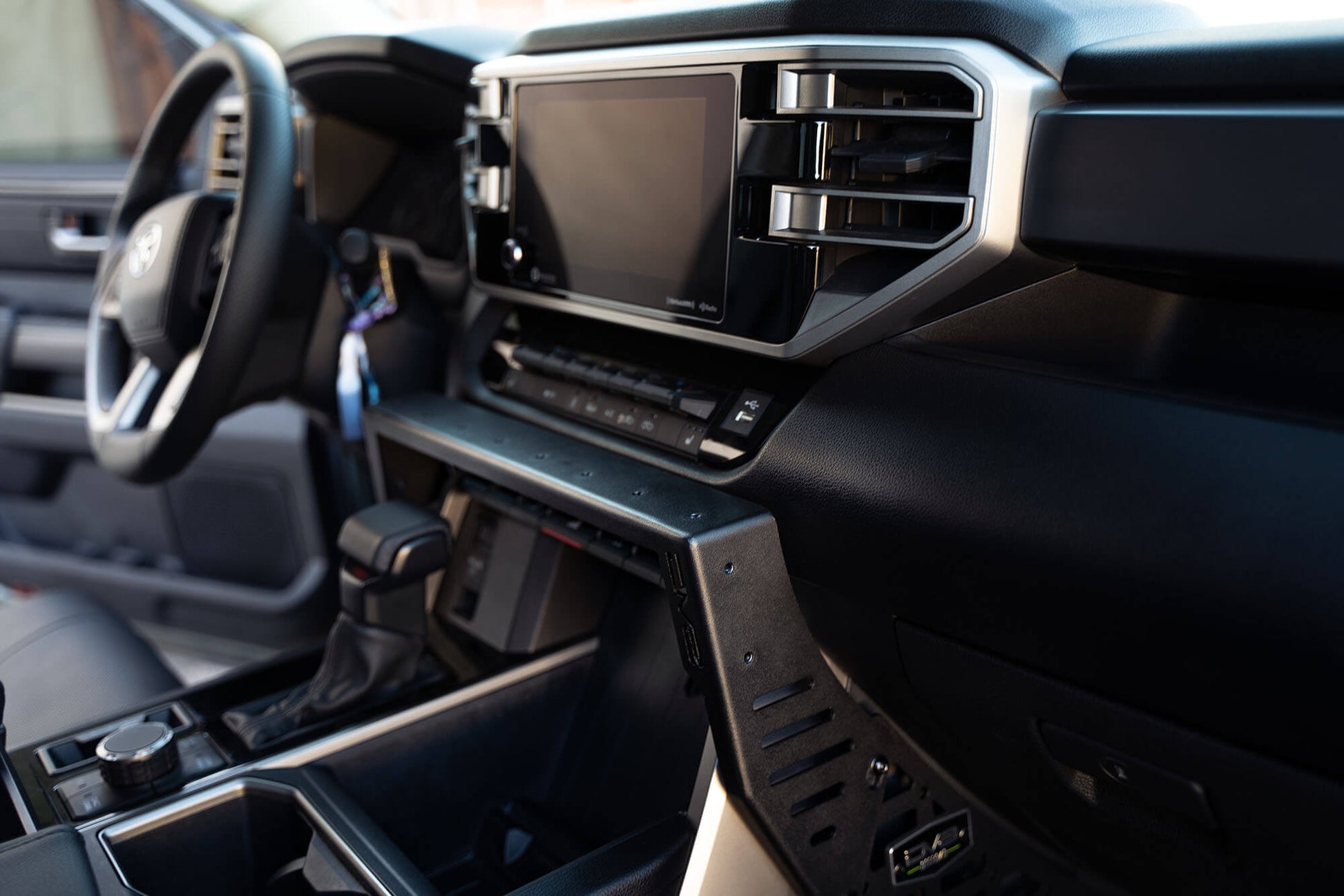 4th-gen-tundra-center-console-molle-panel-digital-device-mount.jpg