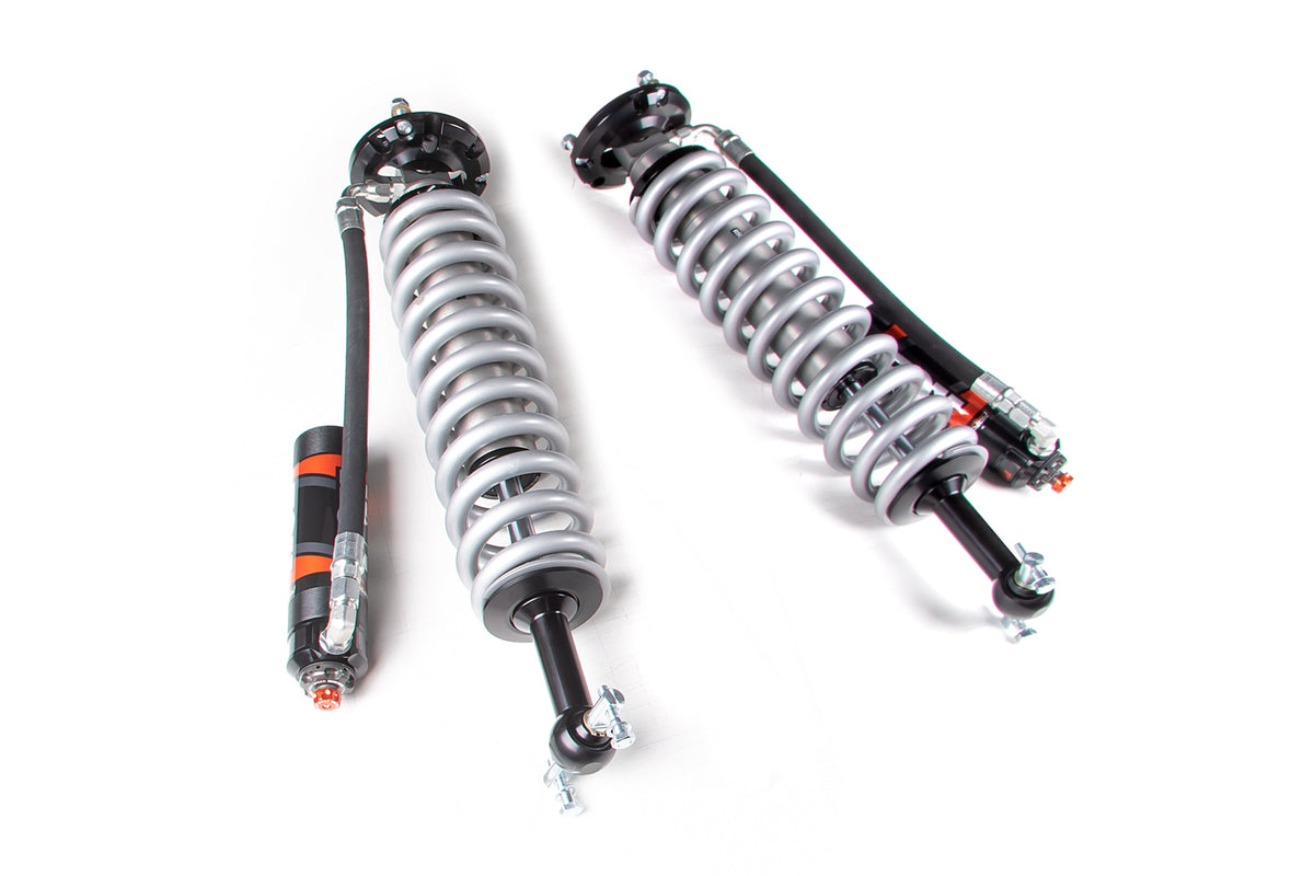 FOX 2.5 Coilover Shocks w/ DSC Reservoir Adjuster | 4 Inch Lift | Performance Elite Series | Chevy Silverado and GMC Sierra 1500 (19-26)